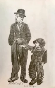 Charlie Chaplin with a child.