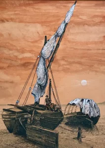 Sailing ship on a beach.